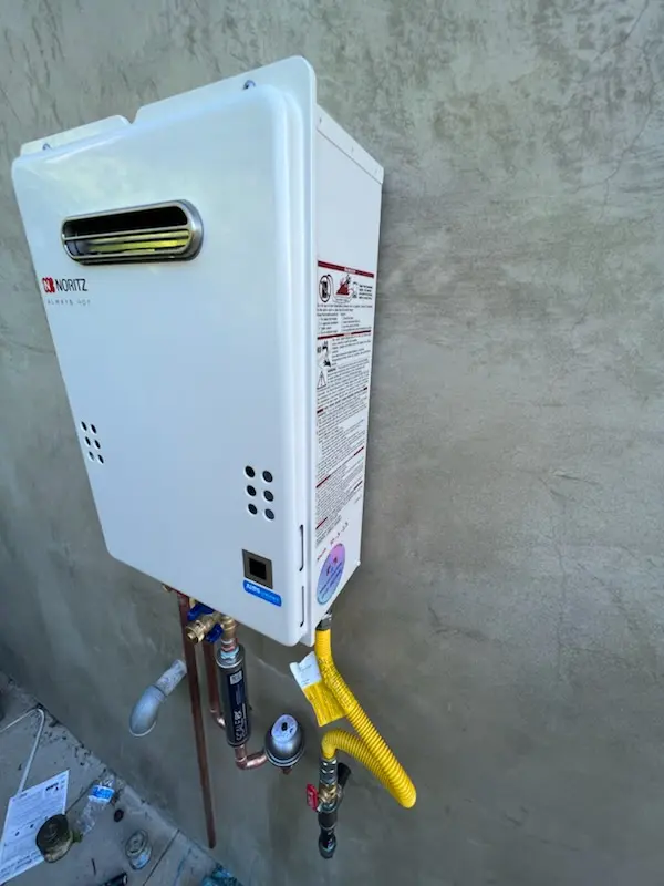 Tankless water heater installation for Wolf Creek Village homes